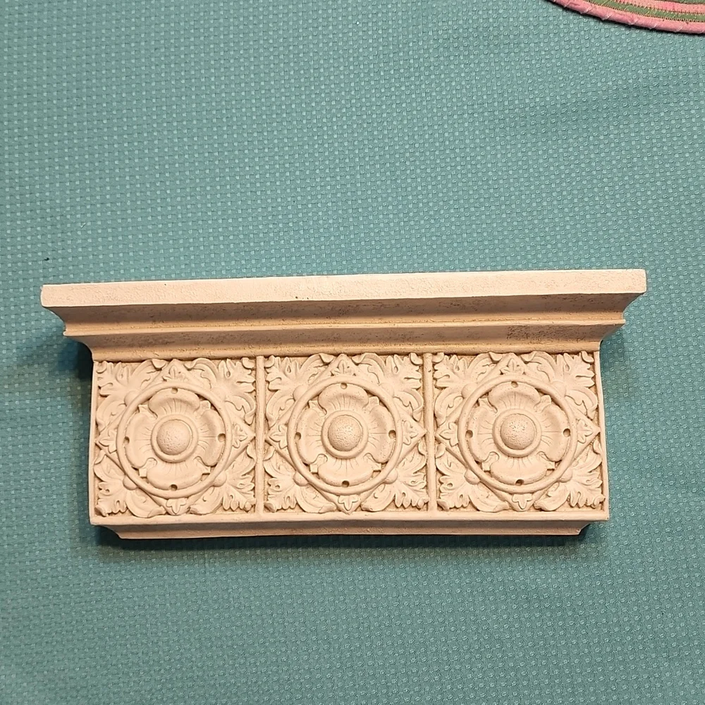 Hermitage off white poly resin floral shelf